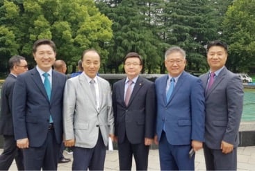 Members of Action for Korea United at the YMCA site