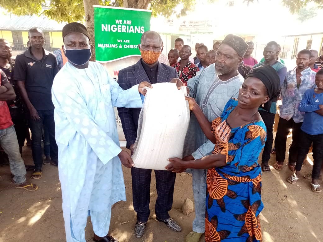 GPF Team presenting bags of rice