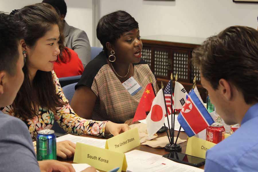 IYLA participants gathered at a table