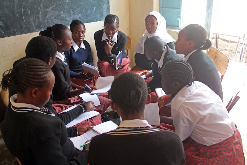 Students huddling together