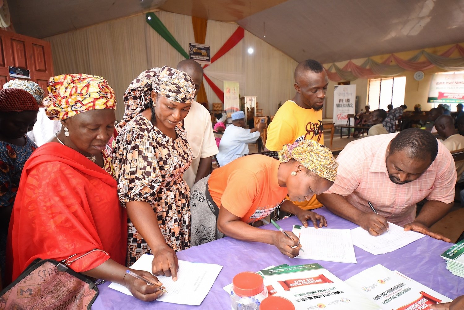 People across Fantsuwan Chiefdom register for GPF Nigeria workshop on peacebuilding.
