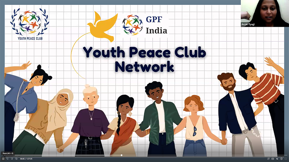 A diverse group of youth holding hands under the